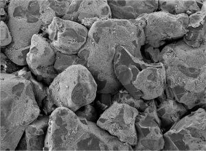 SEM image of sandstone with multi-Darcy permeability at 3.5kms burial depth, primary pores are preserved by early diagenetic chlorite pellicles, Lower Goru, Pakistan.