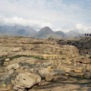 Jurassic tidal sandstones near Elgol, with the Cuillin Mountains behind, Isle of Skye